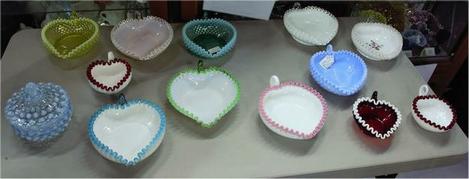 A group of colorful Fenton glass pieces