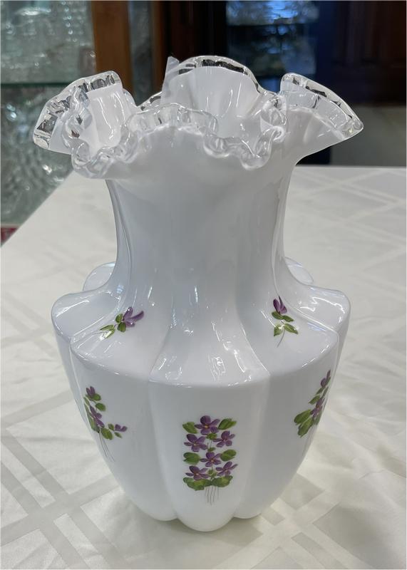 White glass pieces in a museum display